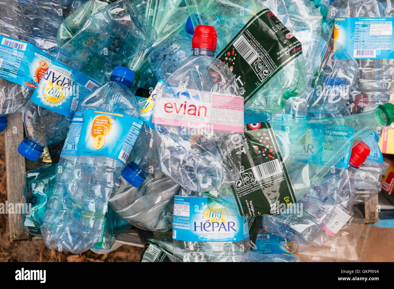 Used plastic water bottles in waste bin for recycling in village of Montazels,Aude Province,South of France. Stock Photo
