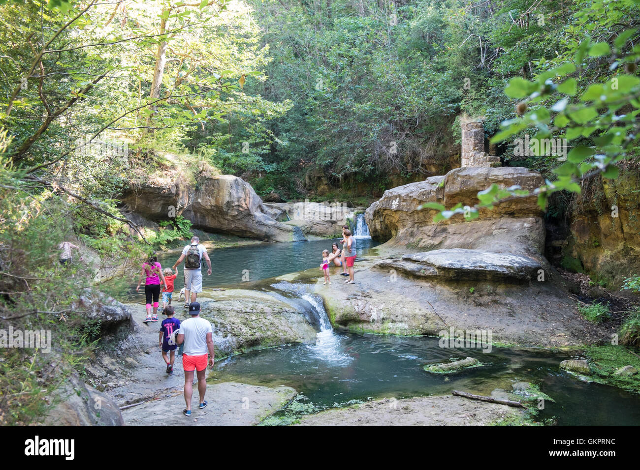 Near Bugarach. Waterfall,cooling stream river in valley during hot summer. Stock Photo