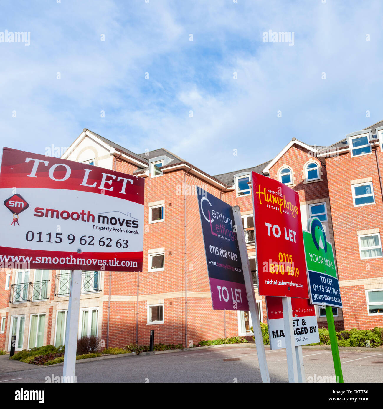 Estate agent boards showing apartments, flats and housing property to let, Nottinghamshire, England, UK Stock Photo