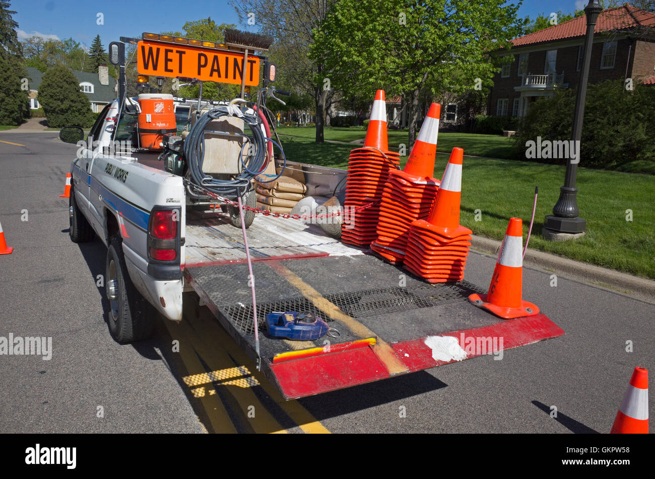 Street paint marker pickup truck carrying orange and white warning cones. St Paul Minnesota MN USA Stock Photo