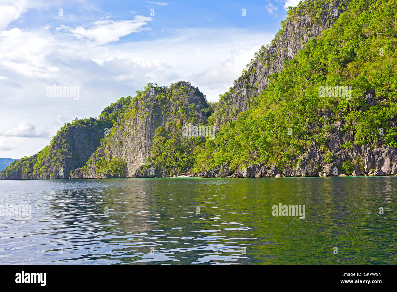 Landscape of Coron Island with a small white sand beach, Philippines. Stock Photo