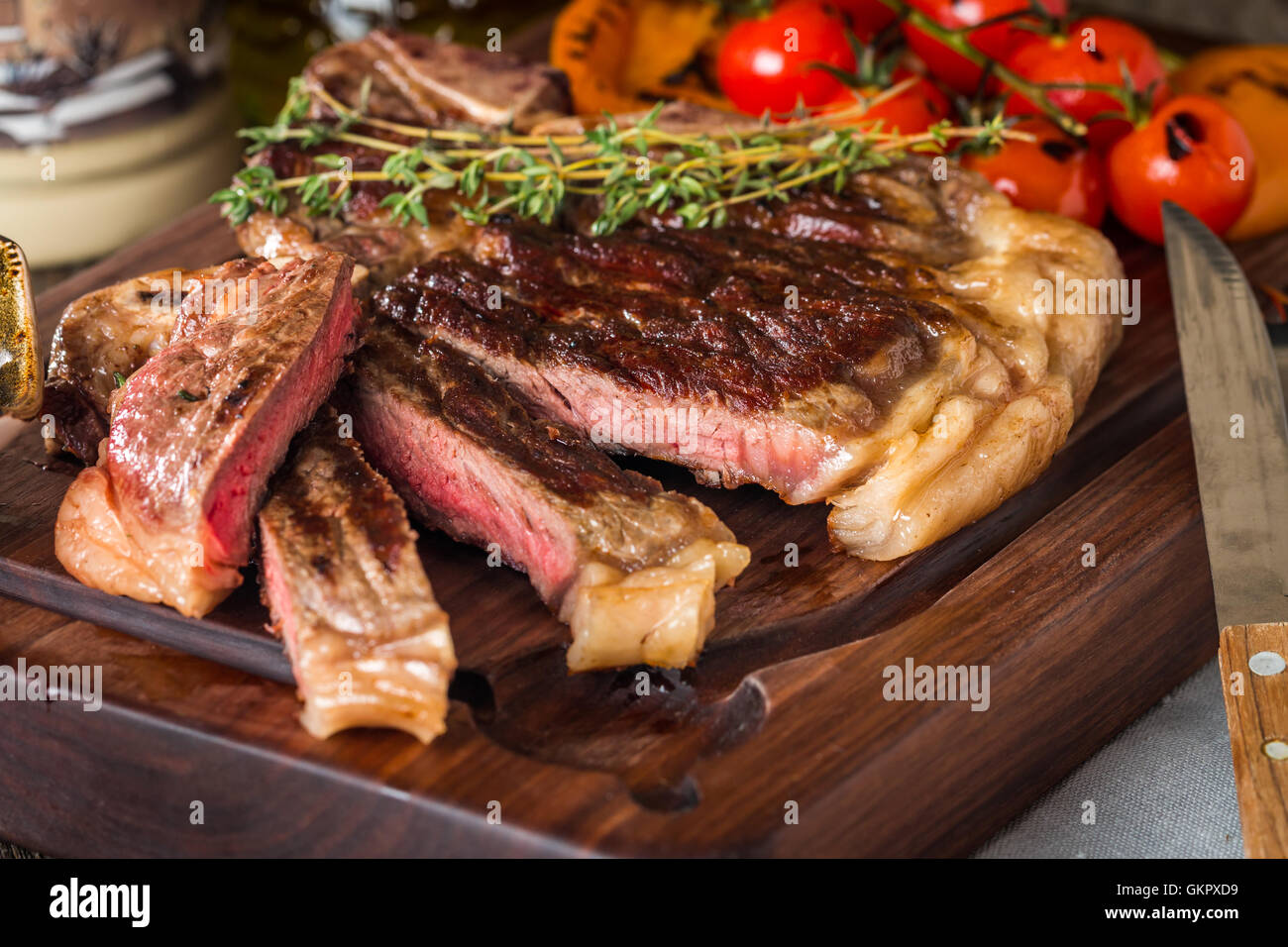 Beef steaks with grilled vegetables and seasoning Stock Photo Alamy