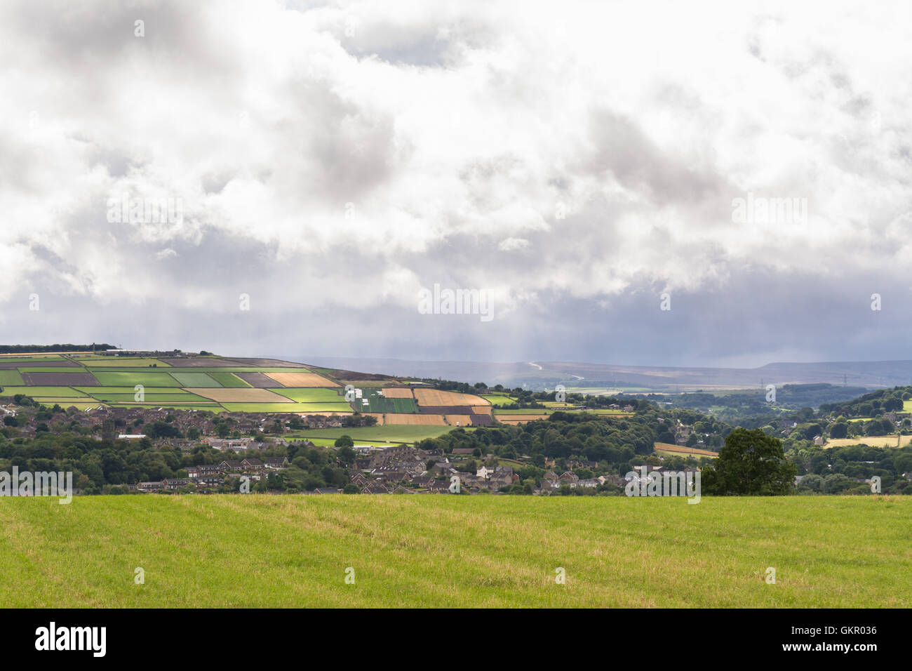 South Yorkshire landscape - view over Penistone market town with A628 road leading over the Pennines in the distance Stock Photo