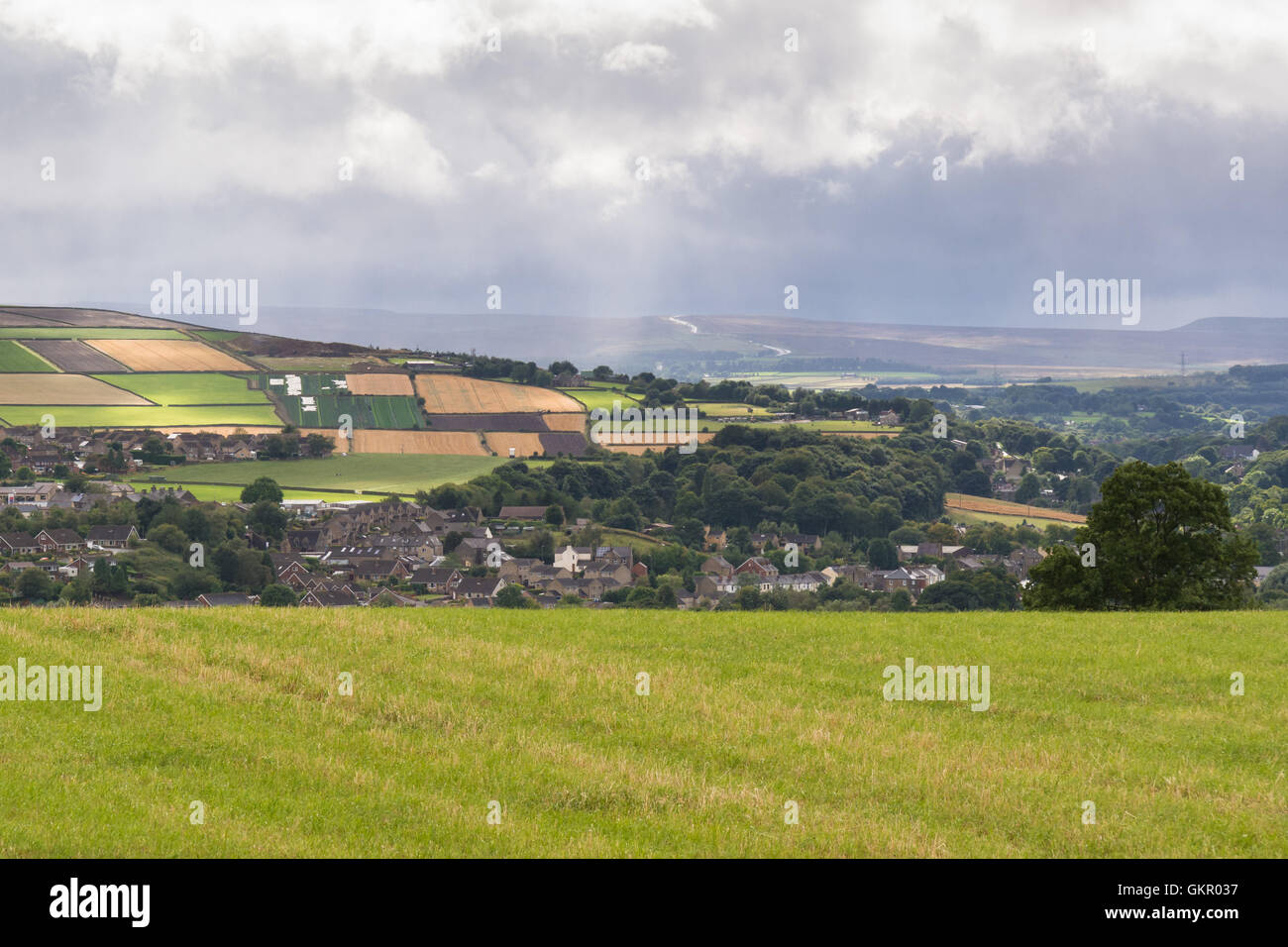 South Yorkshire landscape - view over Penistone market town with A628 road leading over the Pennines in the distance Stock Photo