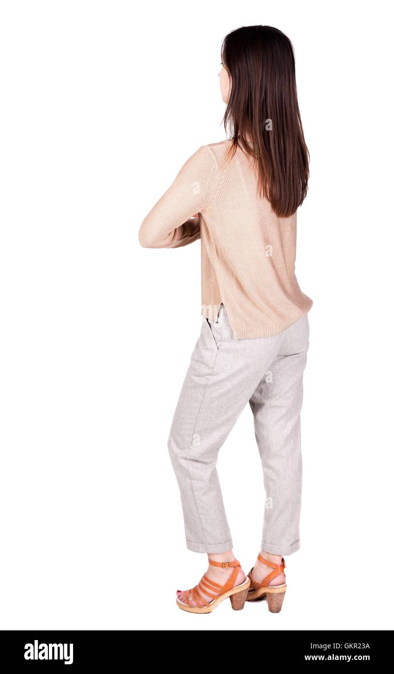 back view of standing young beautiful brunette woman Stock Photo - Alamy