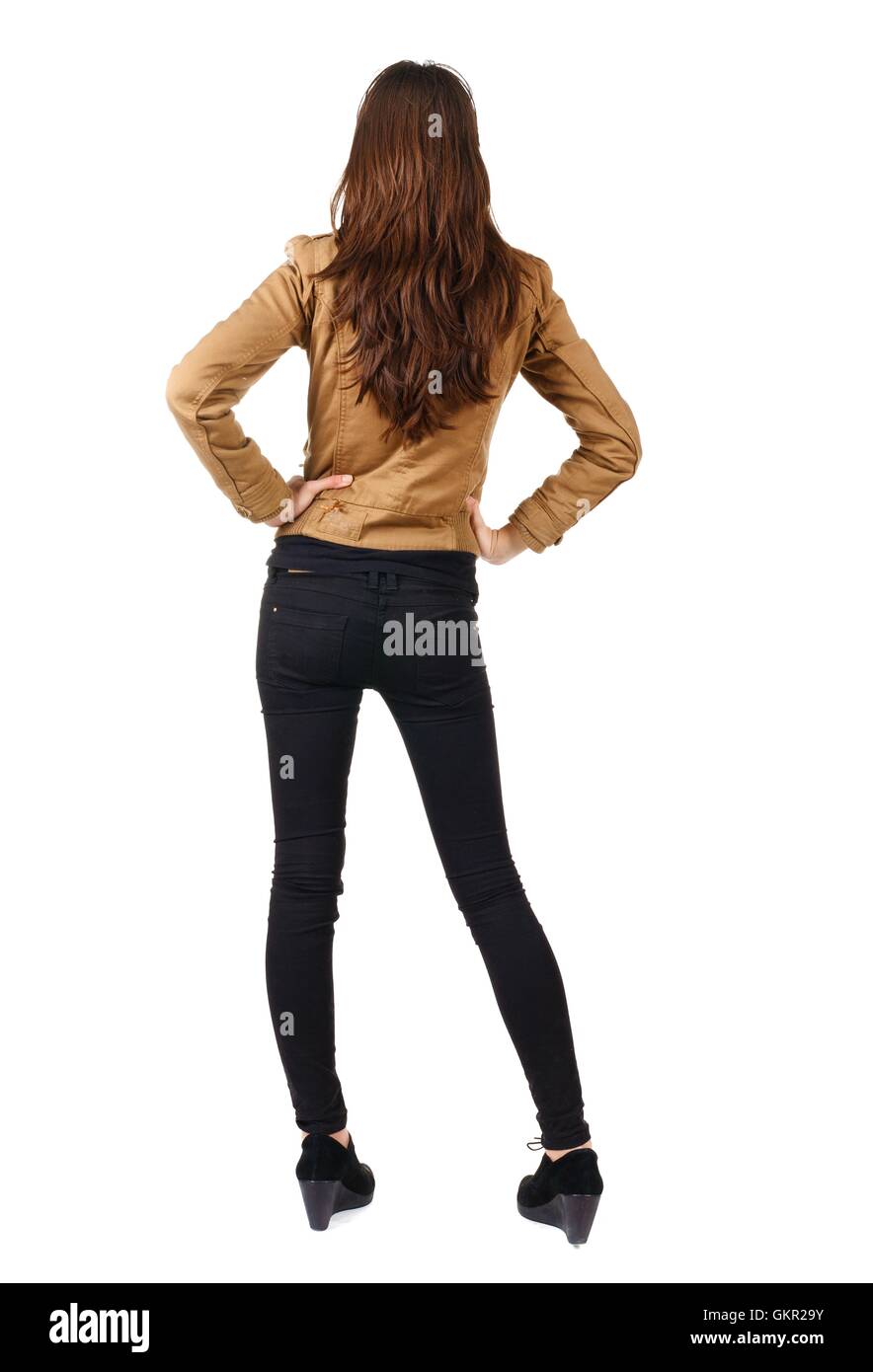 back view of standing beautiful brunette woman Stock Photo - Alamy