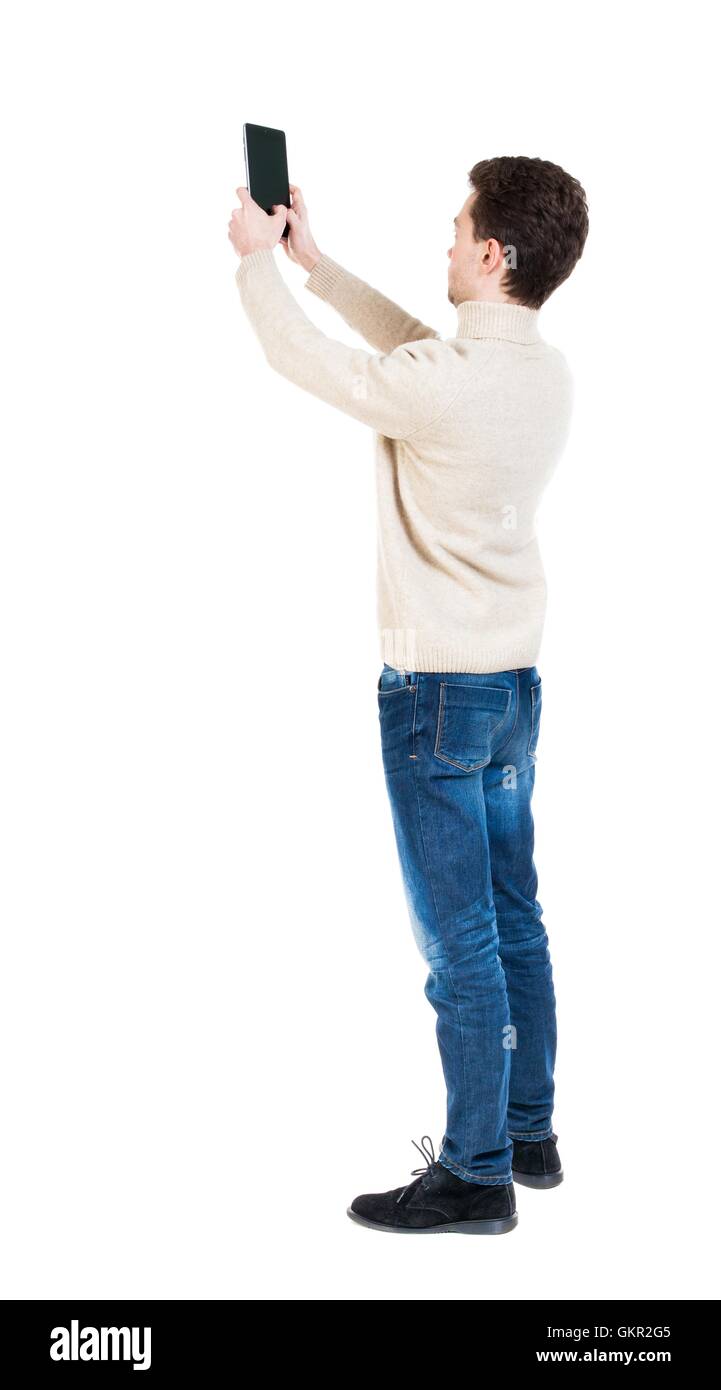 Back view of man with tablet Stock Photo - Alamy