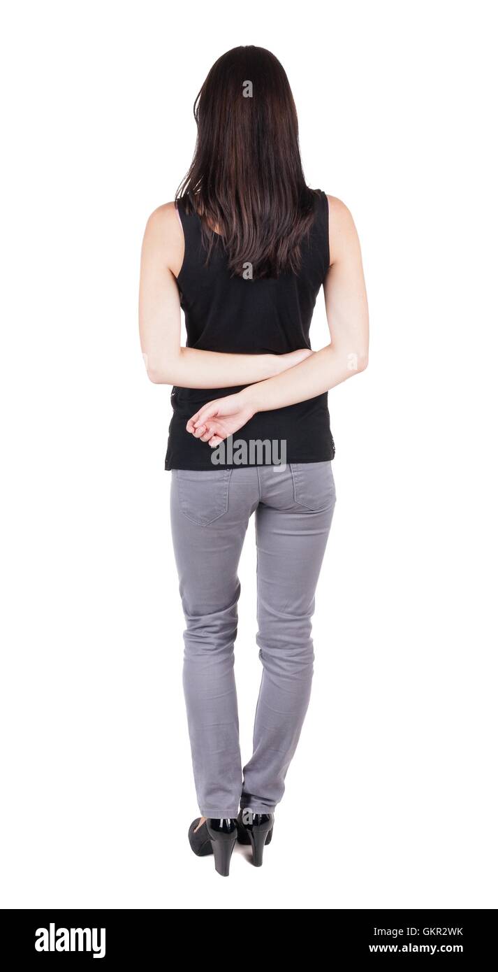 back view of standing young beautiful brunette woman Stock Photo - Alamy