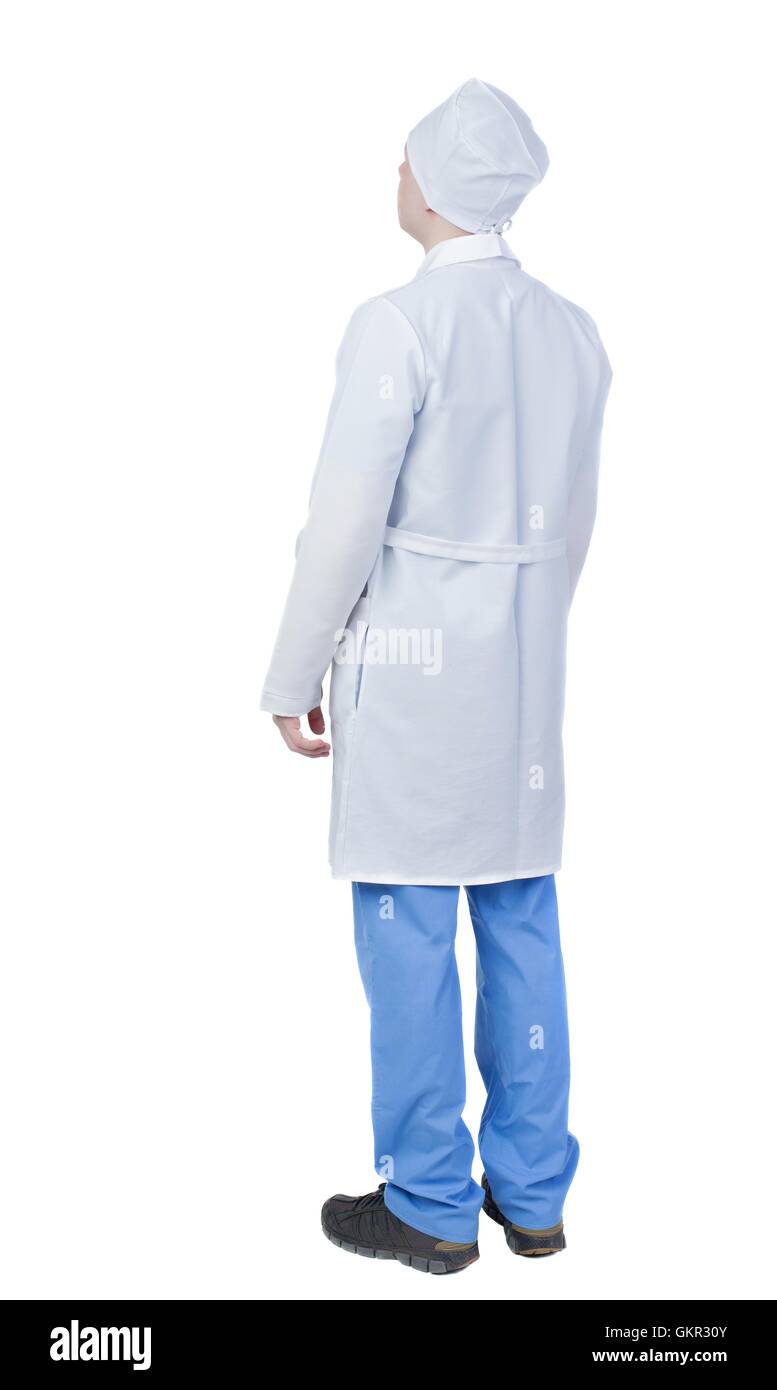 Back view of doctor in robe. Standing young guy. Stock Photo