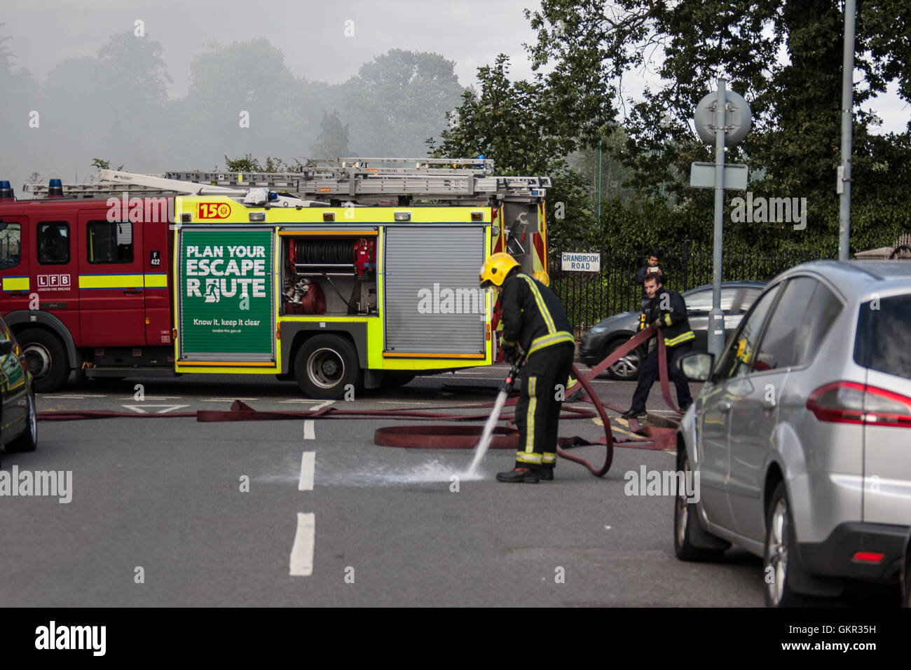London Firefighters tackle a fire in a hotel under renovation. Stock Photo