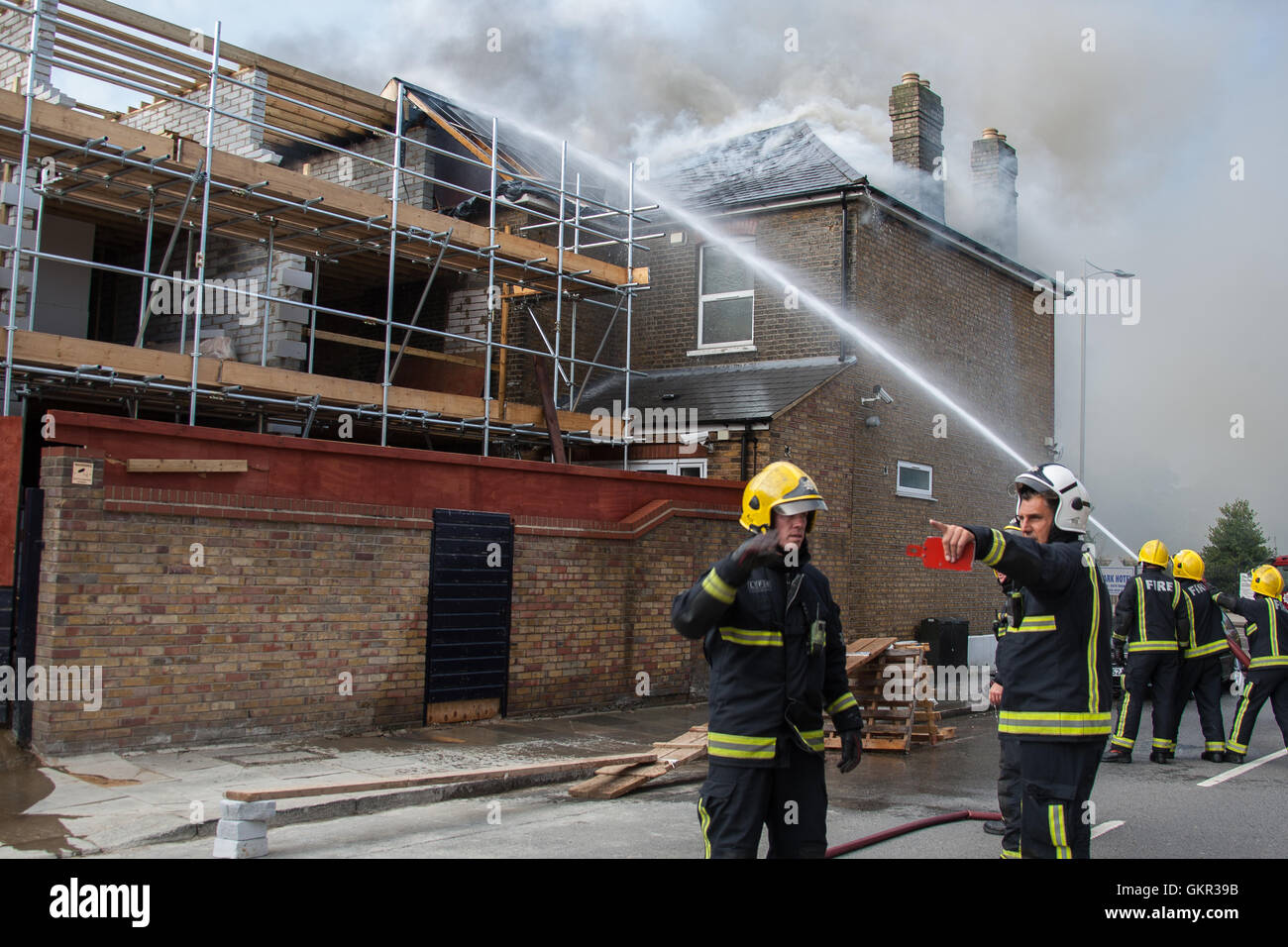 London firefighters at the scene of a hotel fire in East London as