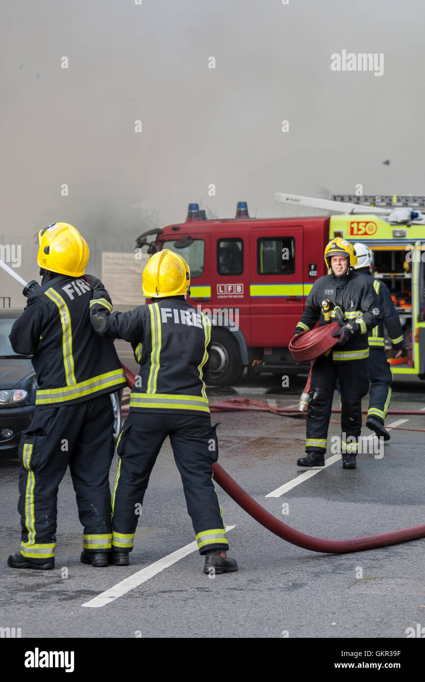 London Firefighters tackle a fire in a hotel under renovation. Stock Photo