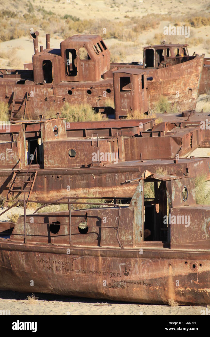Rusted ships on the former seabed of Aral Sea near Moynaq, Uzbekistan. Stock Photo