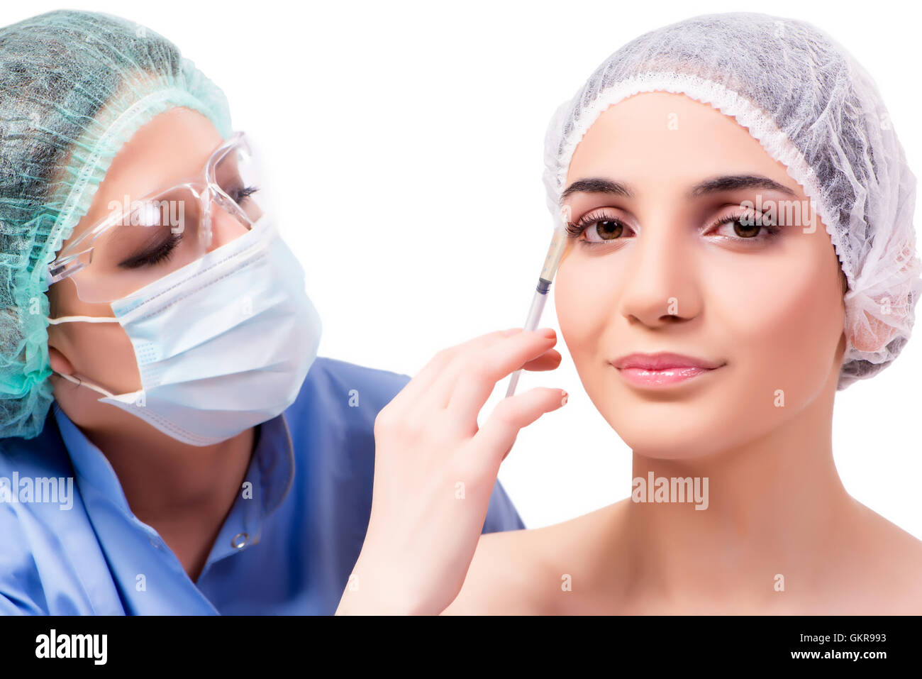 Young woman preparing for plastic surgery isolated on white Stock Photo