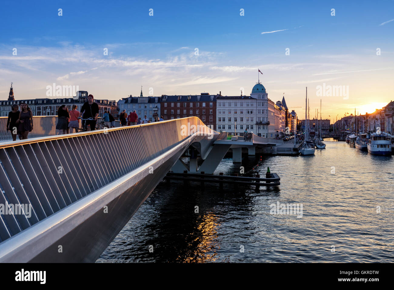 Inderhavnsbroen -  the Inner Harbour pedestrian and cyclist bridge connecting Nyhavn and Christianshavn, Copenhagen, Denmark Stock Photo