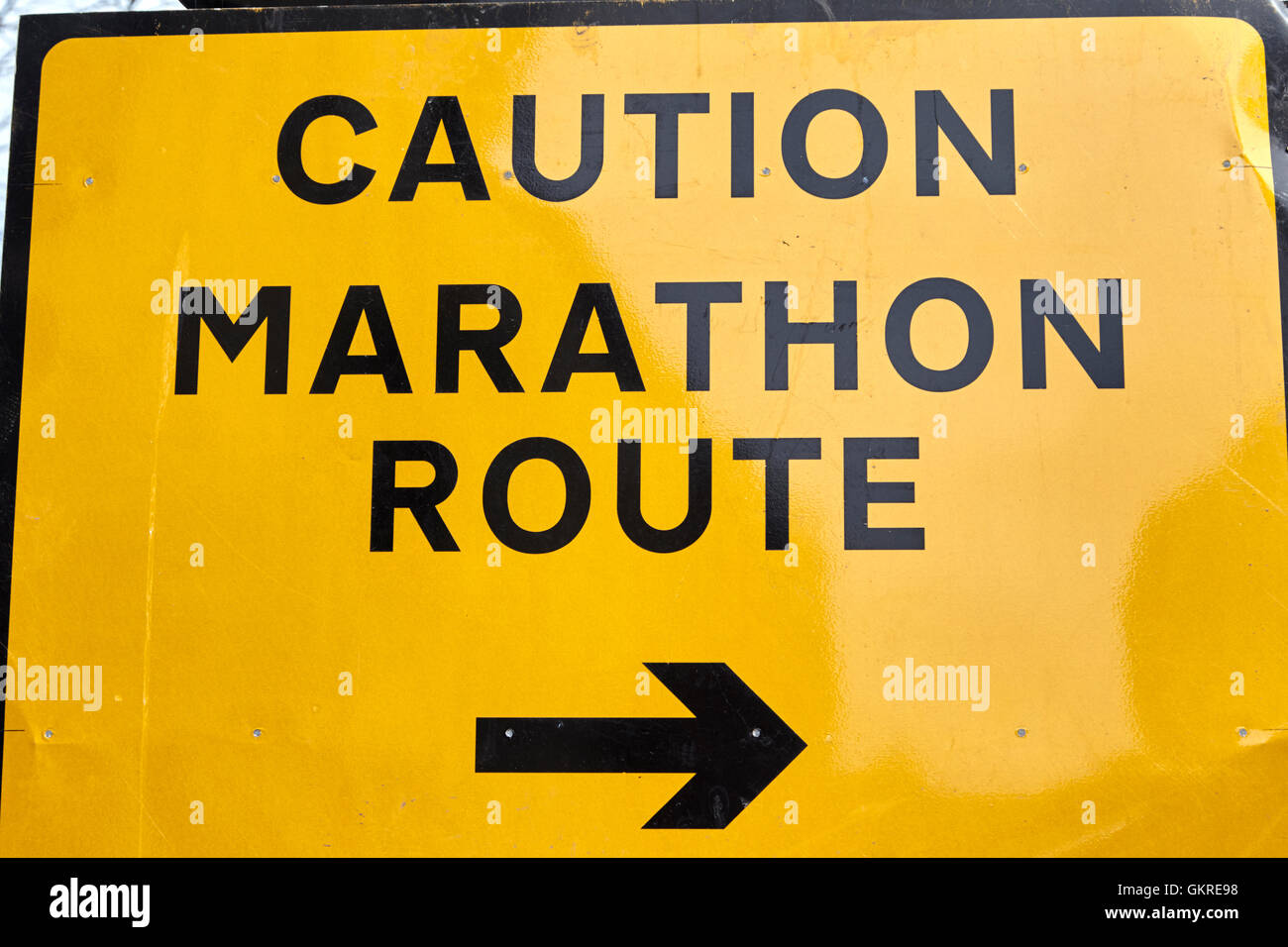 yellow caution marathon route road traffic warning and diversion signs in the uk Stock Photo