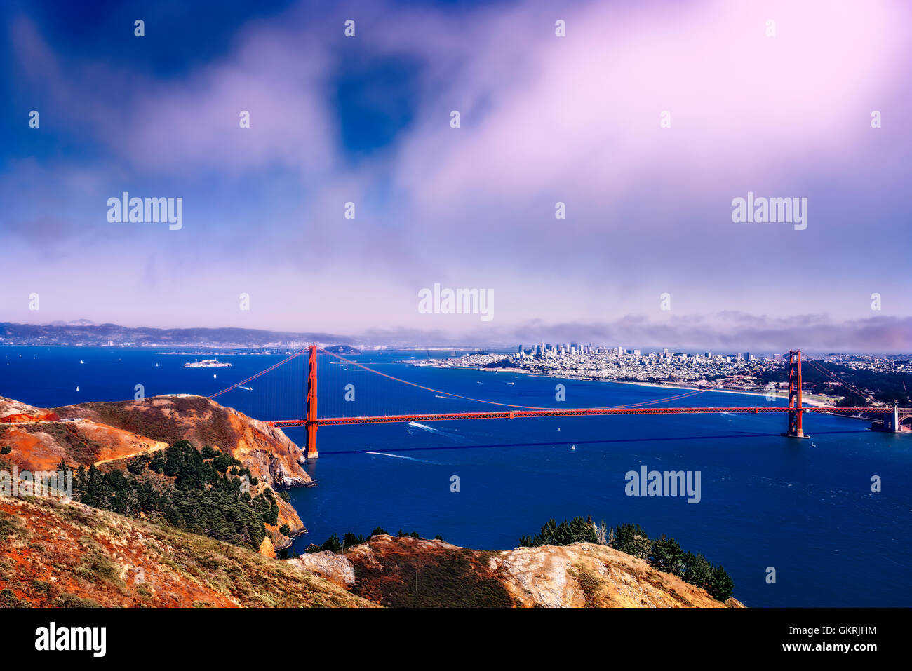 The iconic Golden Gate bridge spans the Golden Gate strait in the city