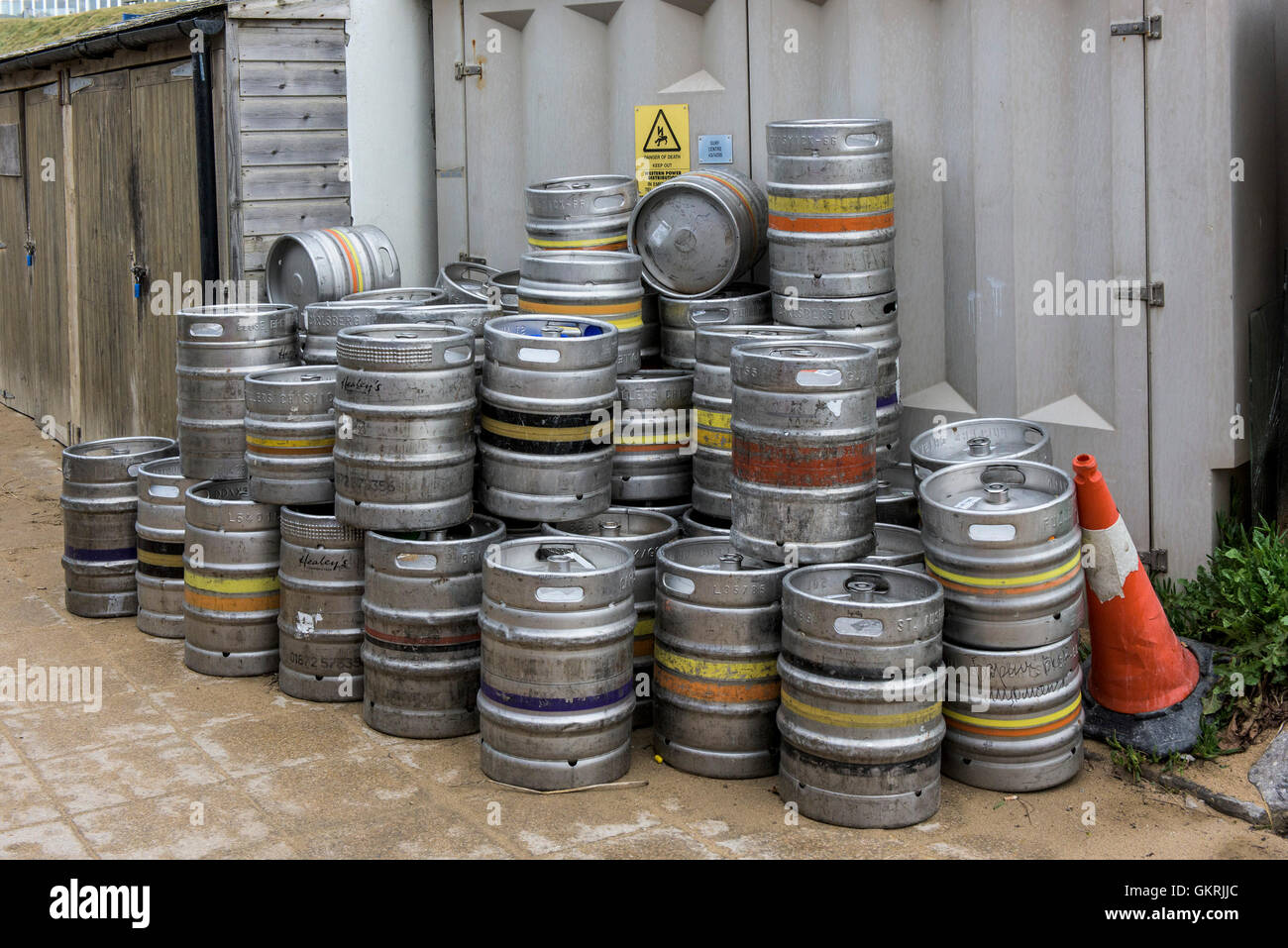 Empty beer kegs waiting collection. Stock Photo