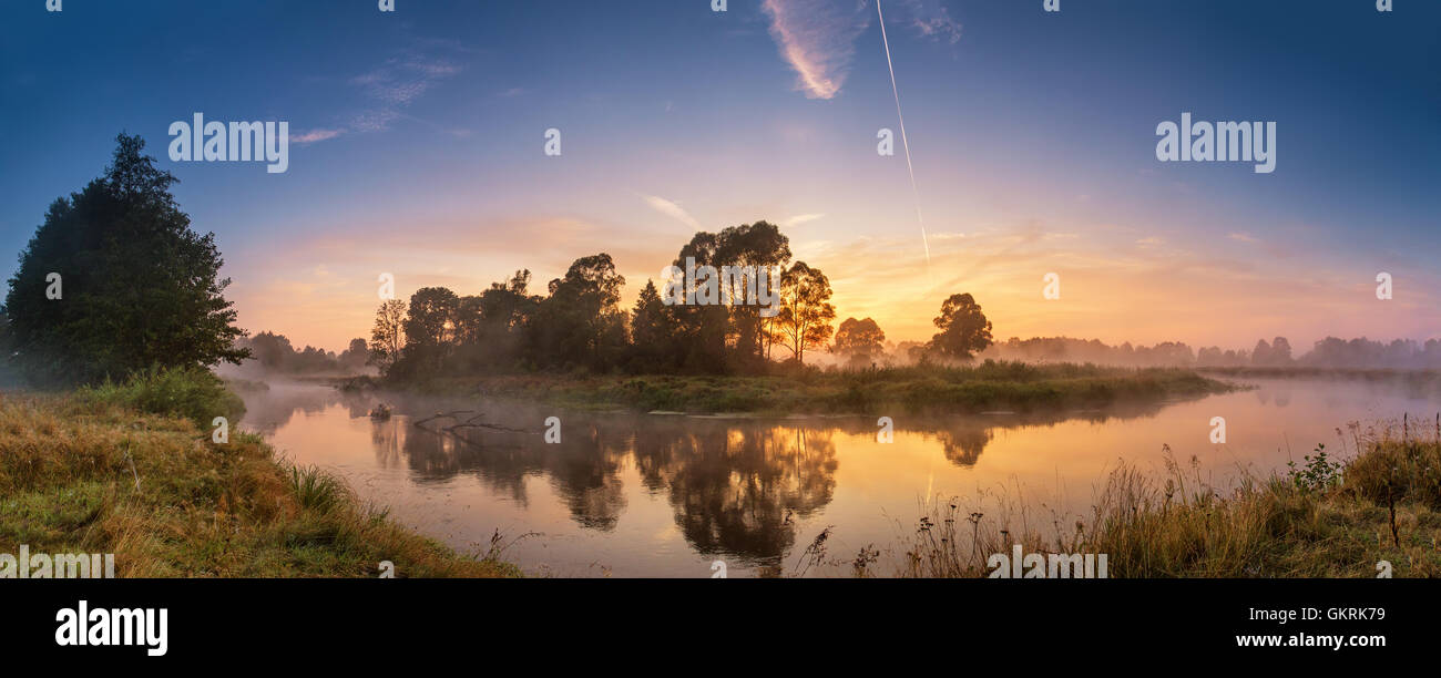 Foggy river in the morning. Panorama Stock Photo - Alamy