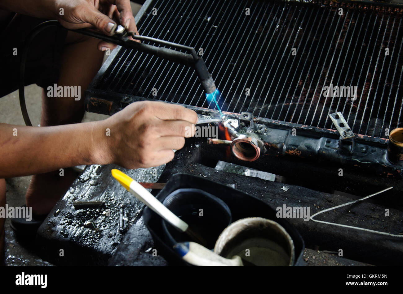 Thai people use lead and gas welding for fix and solder radiator of car