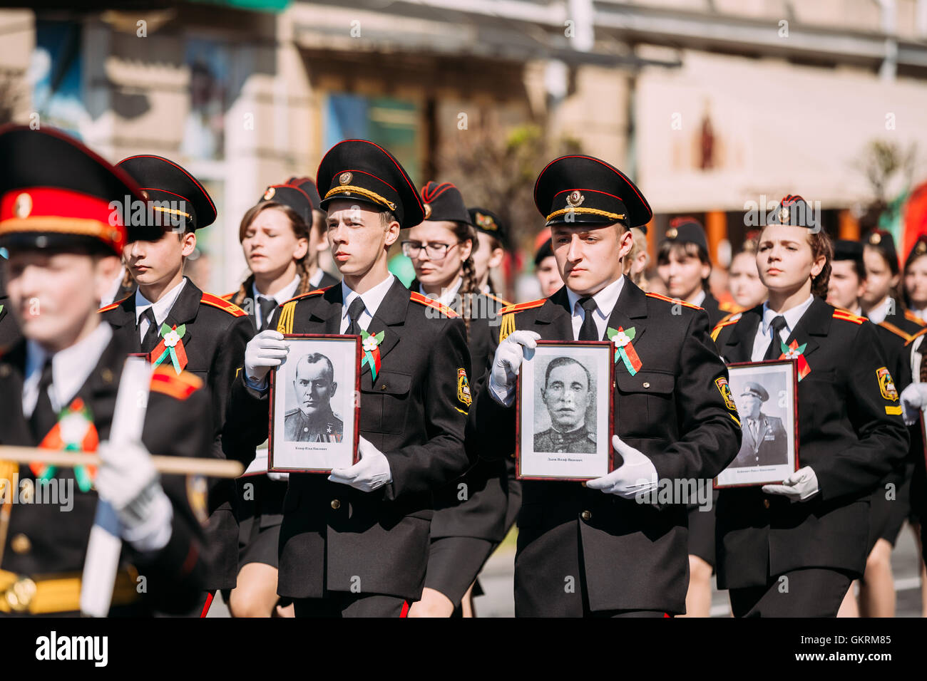 The Immortal Regiment Action March At Parade Procession Of Young People From Gomel State Cadet School With Portreits Of WW2 Hero Stock Photo