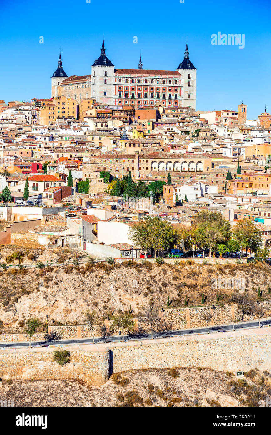 Toledo, Spain. Alcazar and the ancient city on a hill over the Tagus River, Castilla la Mancha medieval attraction of Espana. Stock Photo