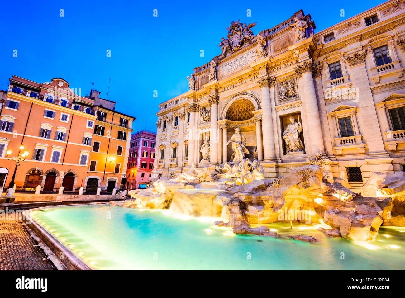 Rome, Italy. Stunningly ornate Trevi Fountain and Poli Palace  (1762) illuminated at night in the heart of Roma. Stock Photo