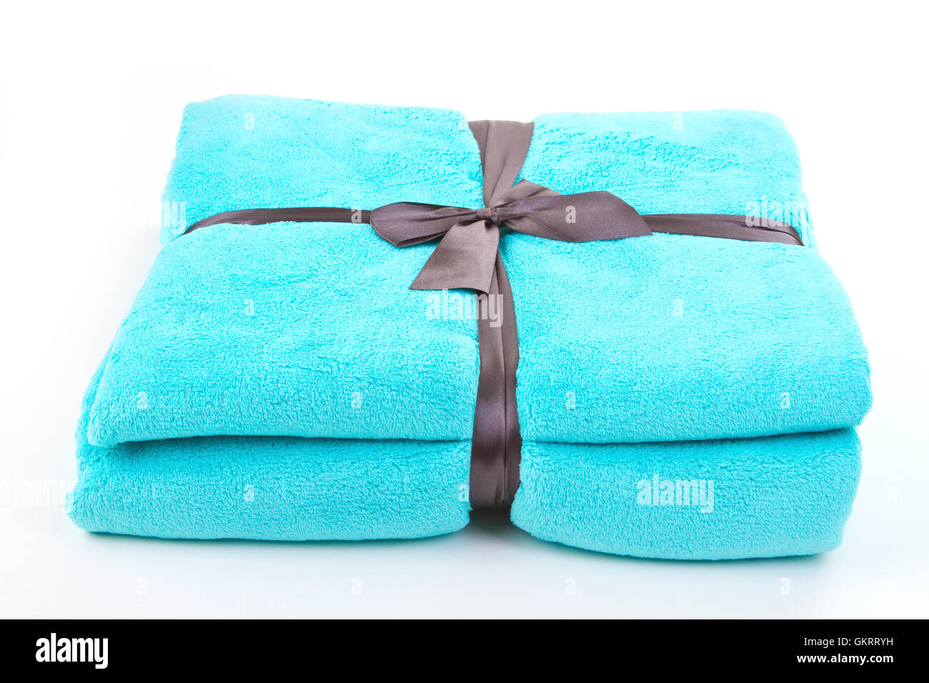 Blanket with ribbon isolated on white background Stock Photo Alamy