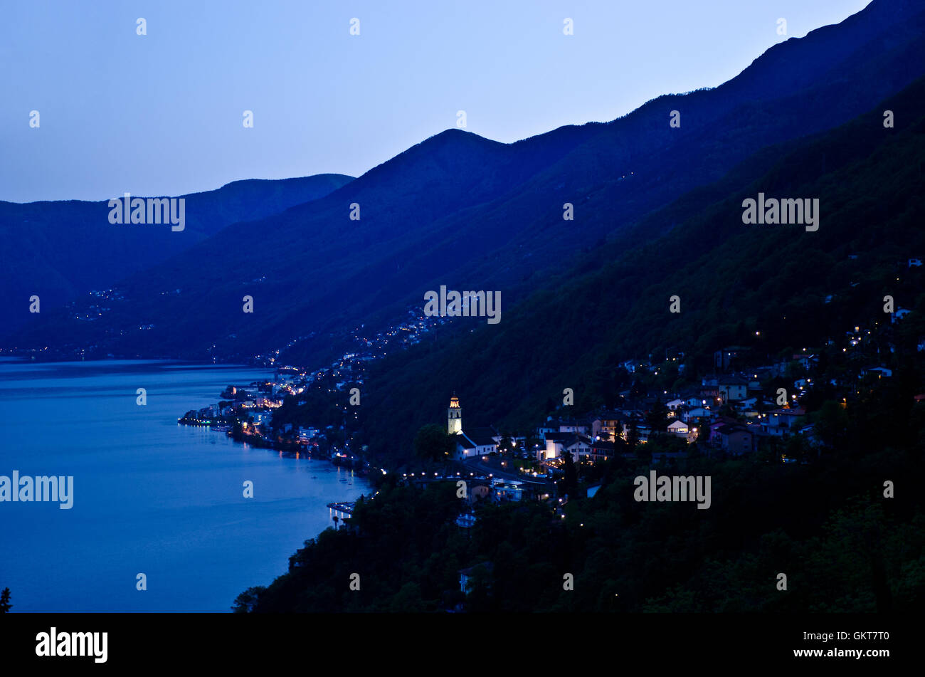 Towns Ronco and Brissago on Lago Maggiore lake at dusk, Ticino, Switzerland Stock Photo