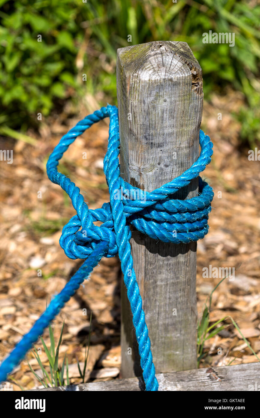 secured rope around mooring stanchion. Norfolk Broads UK Stock Photo