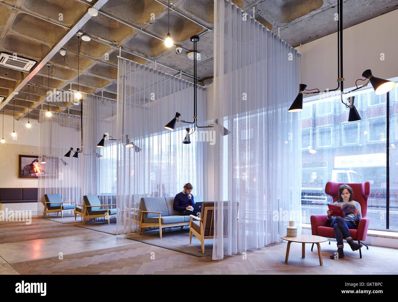 View of main breakout space, ground floor. 201 Borough High Street, London, United Kingdom. Architect: Stiff + Trevillion Architects, 2016. Stock Photo