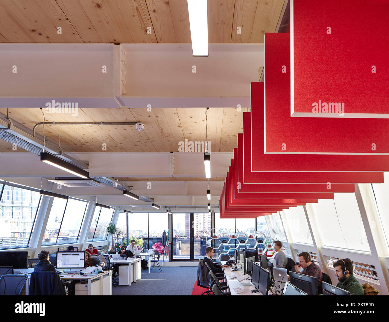 Penthouse office with tech firm and workers,. 201 Borough High Street, London, United Kingdom. Architect: Stiff + Trevillion Architects, 2016. Stock Photo