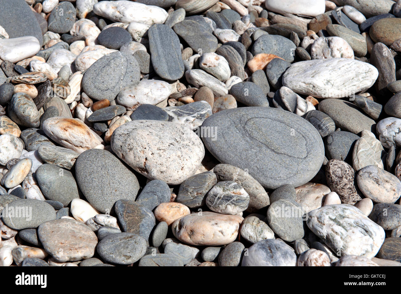 Pebble background. Pebbly beach at Tauparikaka Marine Reserve, Haast ...