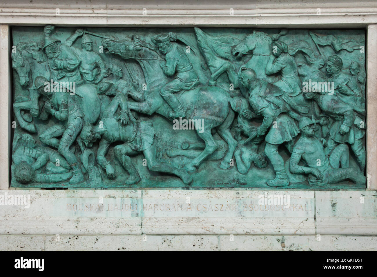 Hajduks leading by Istvan Bocskai defeat the Habsburg imperial army at the Battle at Almosd and Bihardioszeg on 15 October 1604. Bronze relief by Hungarian sculptor Laszlo Marton on the Millennium Monument in the Heroes Square in Budapest, Hungary. Stock Photo