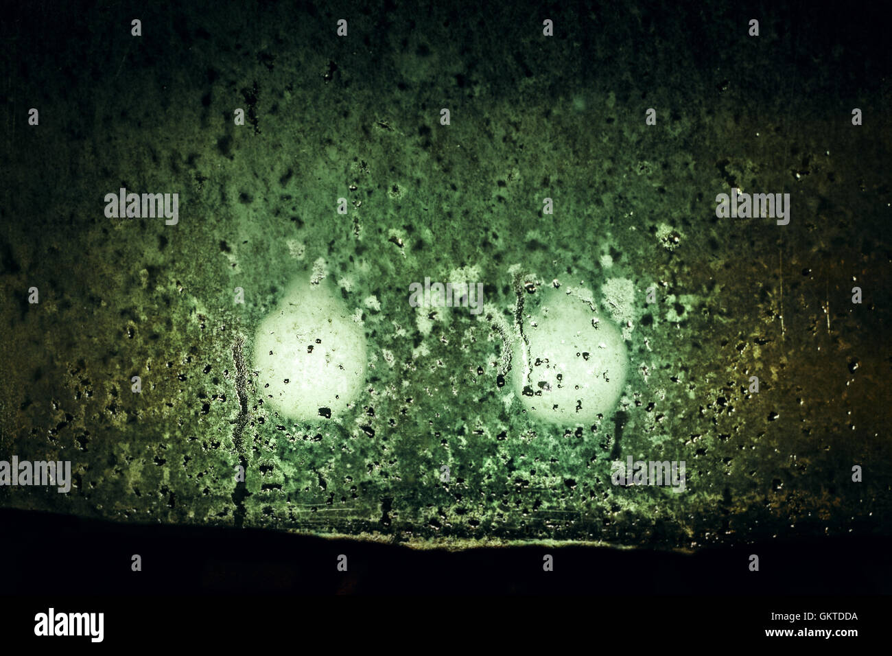 Dim lights outside night window in inclement weather Stock Photo Alamy