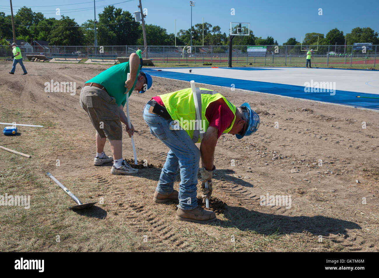 Detroit, Michigan - Workers install system to prevent storm water flooding at Denby High School. Stock Photo