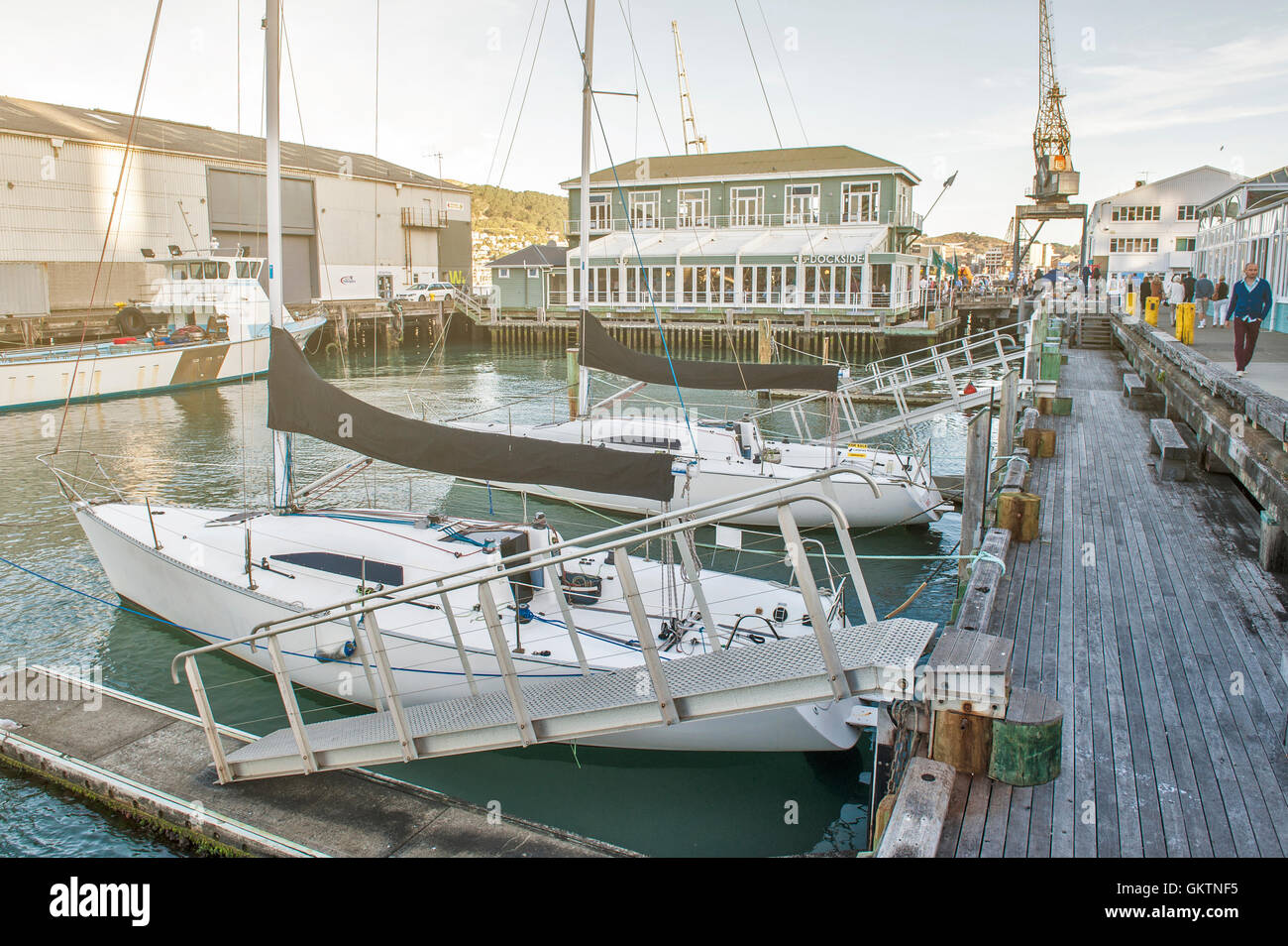 Wellington, New Zealand - March 3, 2016: Yachts docking at Wellington waterfront, north island of New Zealand Stock Photo