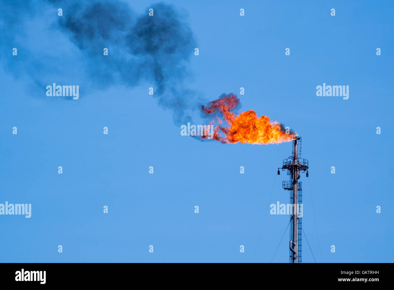 flaring of associated gas at oil refinery Stock Photo