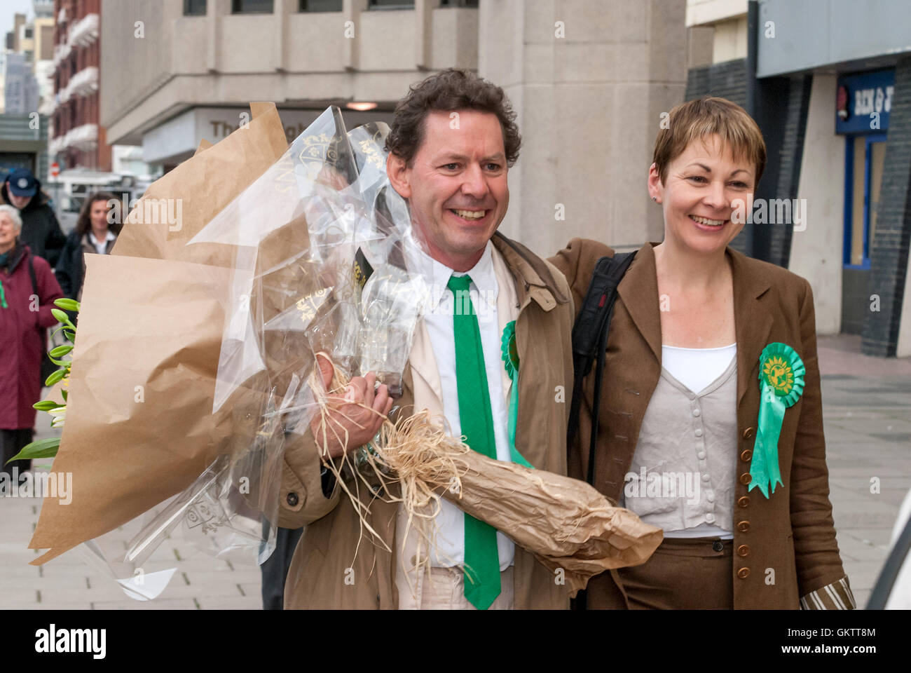 Caroline Lucas MP, on the night she was elected to Parliament, with husband  Richard Savage, in the white suit Stock Photo - Alamy