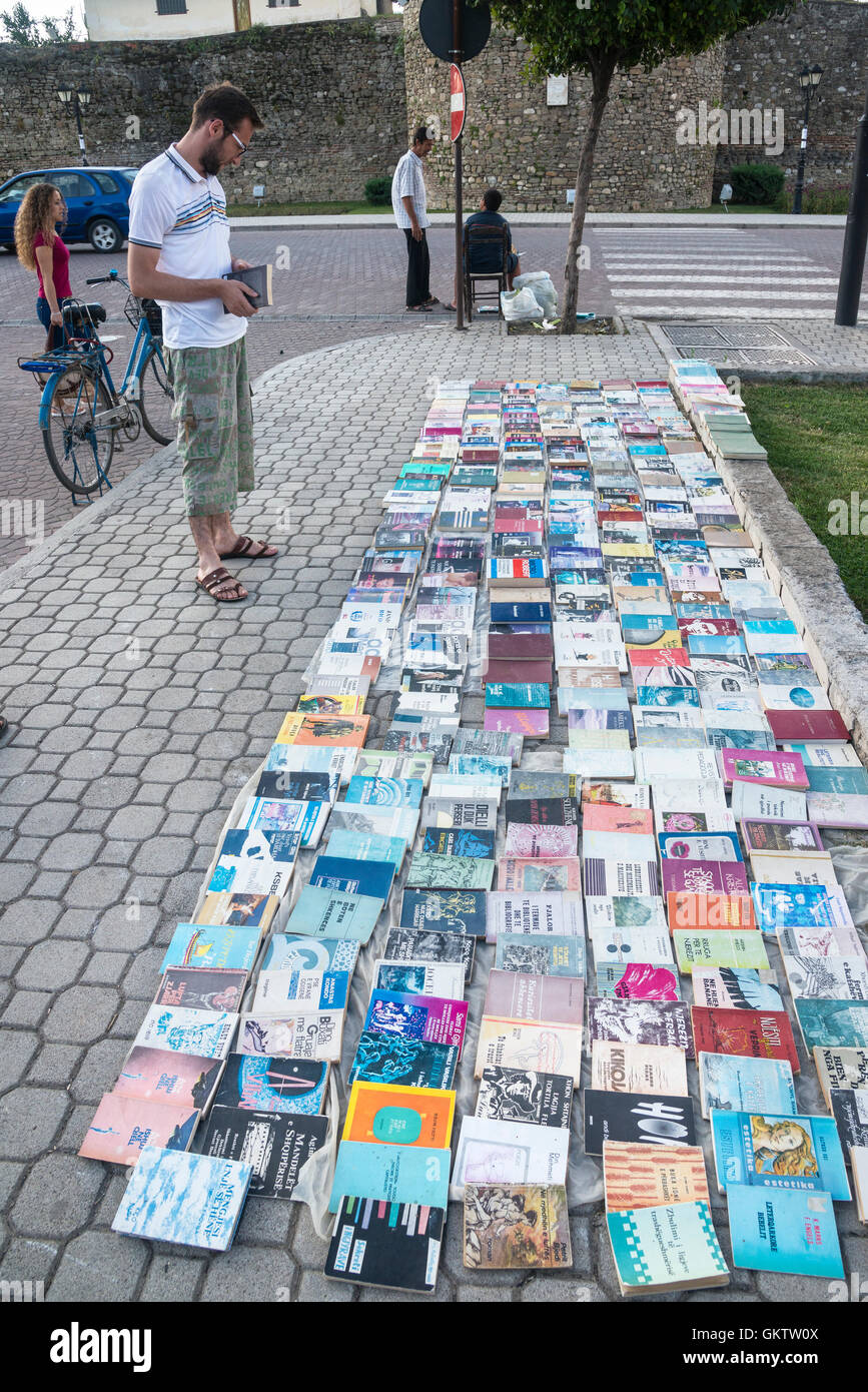 Selling second hand books on the Boulevard Qemal Stafa in the centre of Elbasan,  Central Albania, Stock Photo