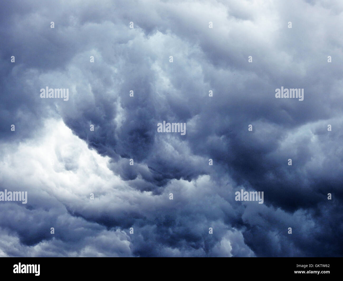 Massive dark blue clouds Stock Photo Alamy