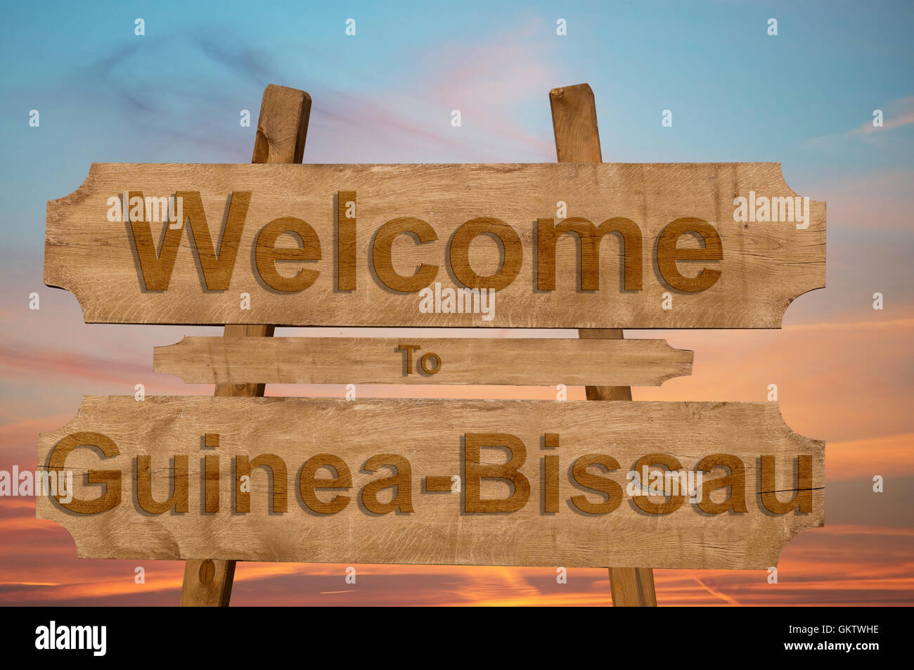 Welcome to Guinea Bissau sing on wood background Stock Photo