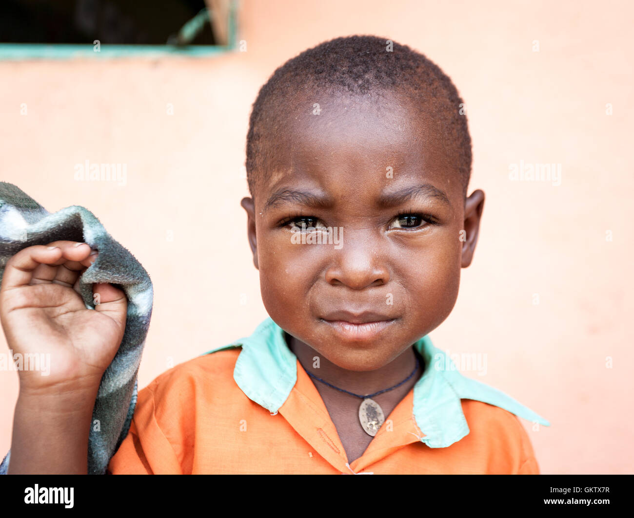 A young boy at a school in Uganda Stock Photo