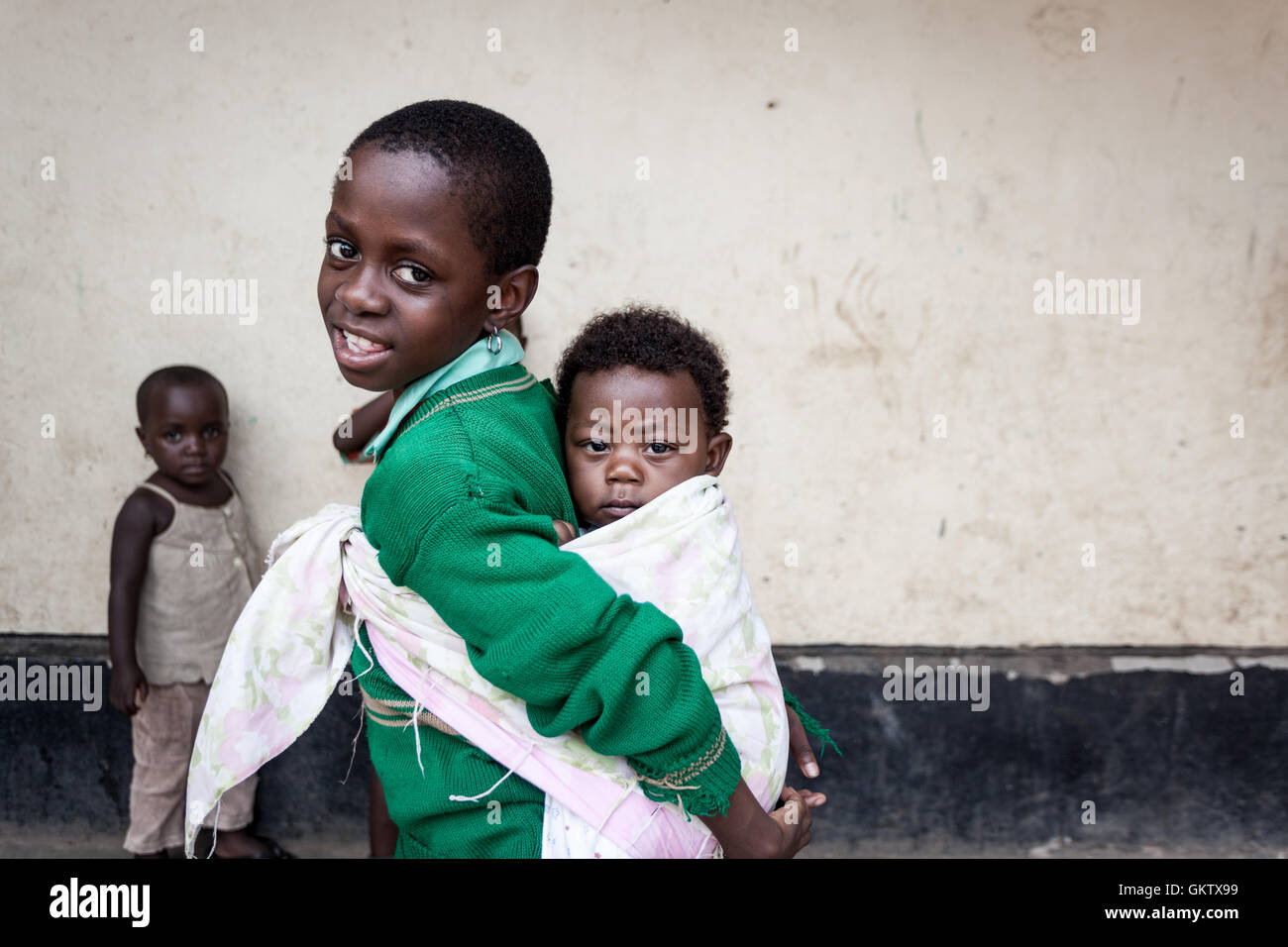 girls pose for the camera at a school in kasese, uganda Stock Photo