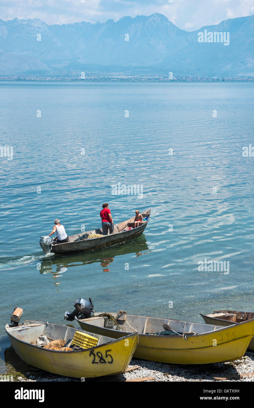 Fishing boats at the village of Zogaj on the shore of Lake Shkodra, Shkodra, Northern Albania. Stock Photo