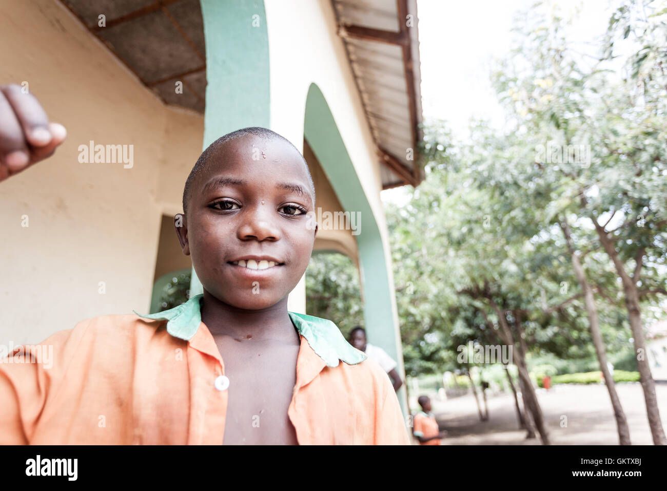 A young boy poses for the camera at a school in kasese, uganda Stock Photo