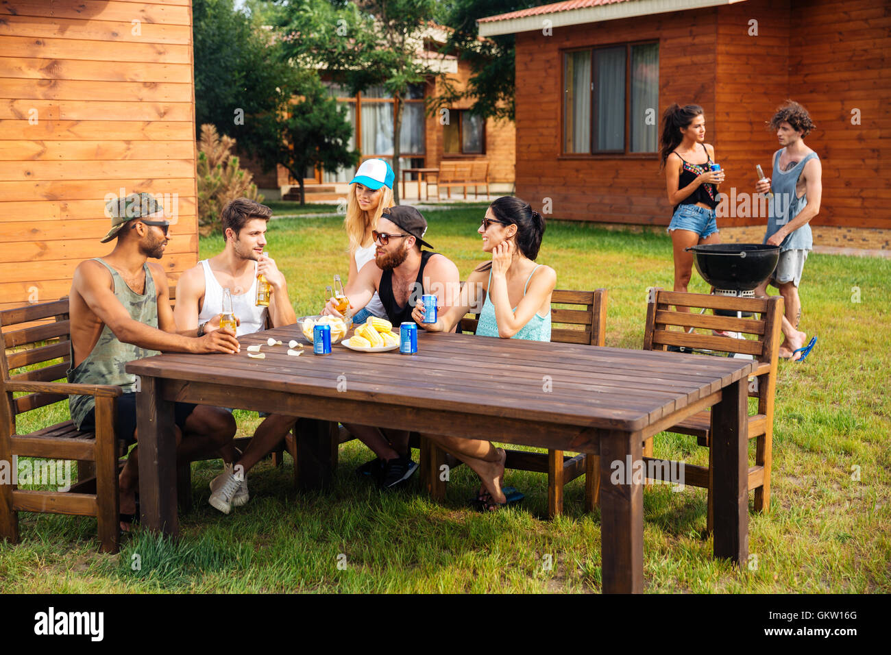 Lovely friends talking sitting hi-res stock photography and images - Alamy