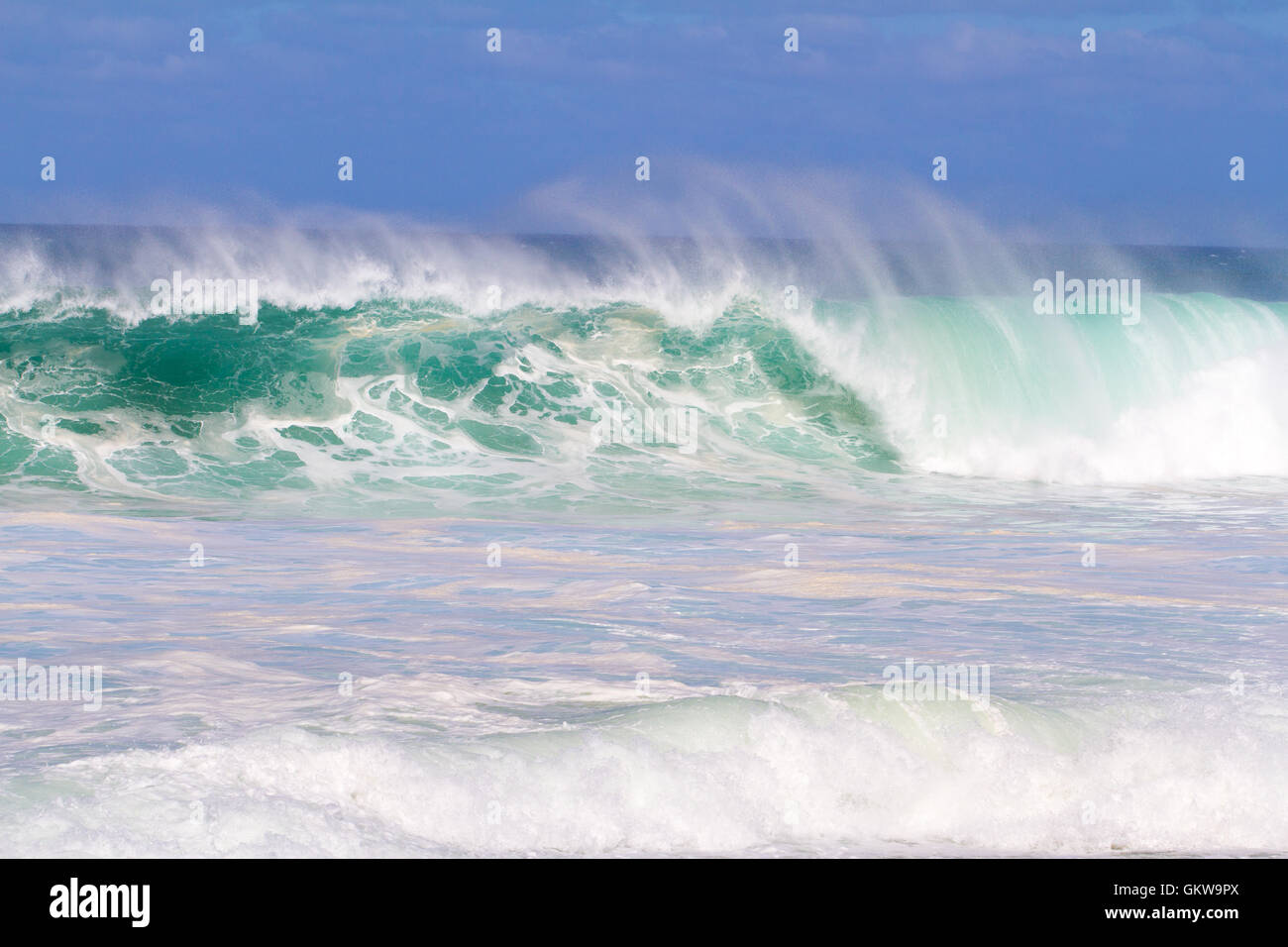 Big Wave Breaking in Hawaii Stock Photo - Alamy