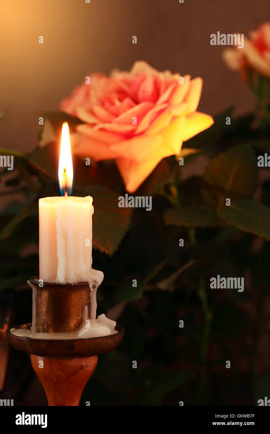 Candle And Rose Stock Photo - Alamy