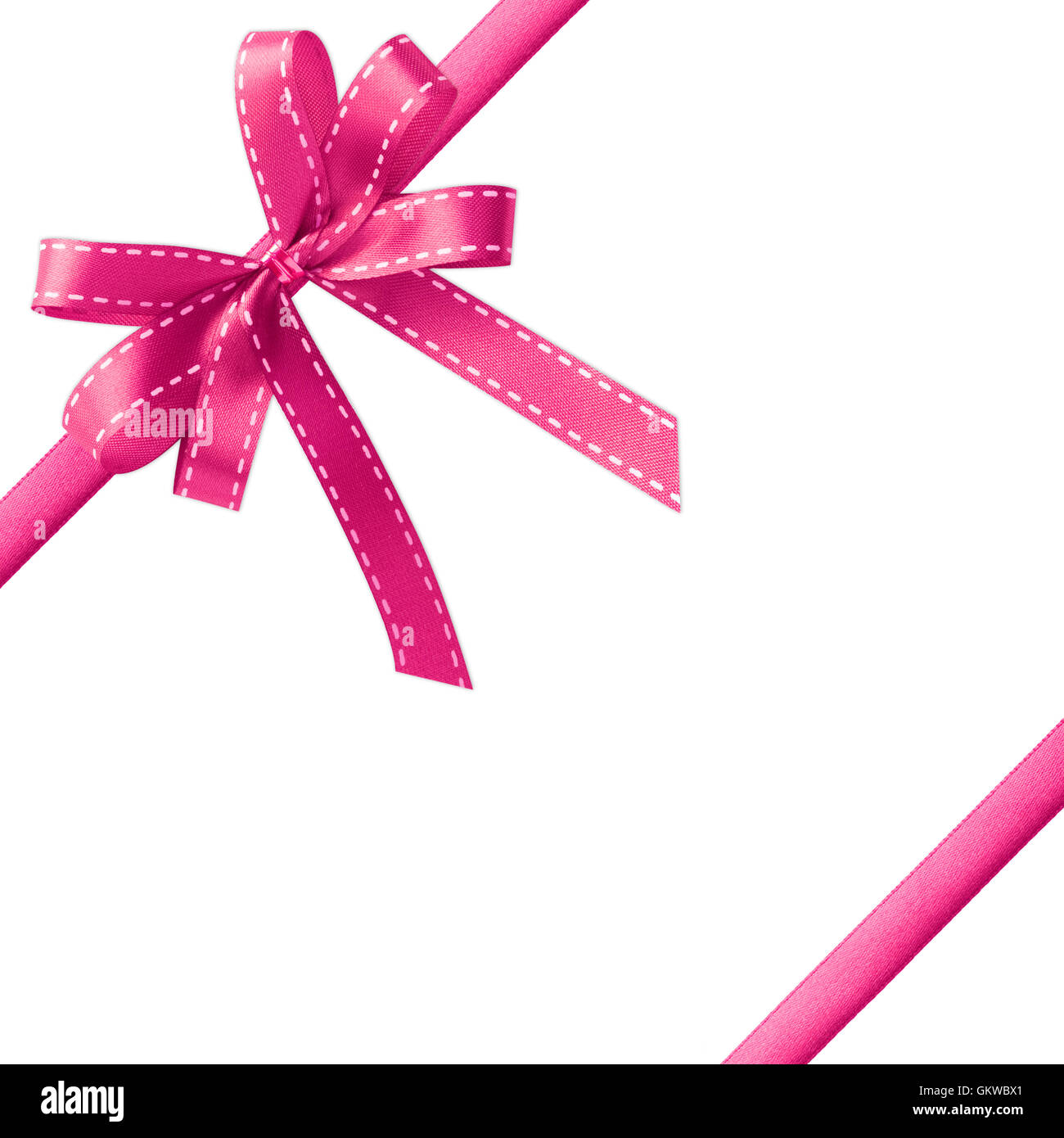 Shiny Pink satin ribbon on white background with copy space Stock Photo